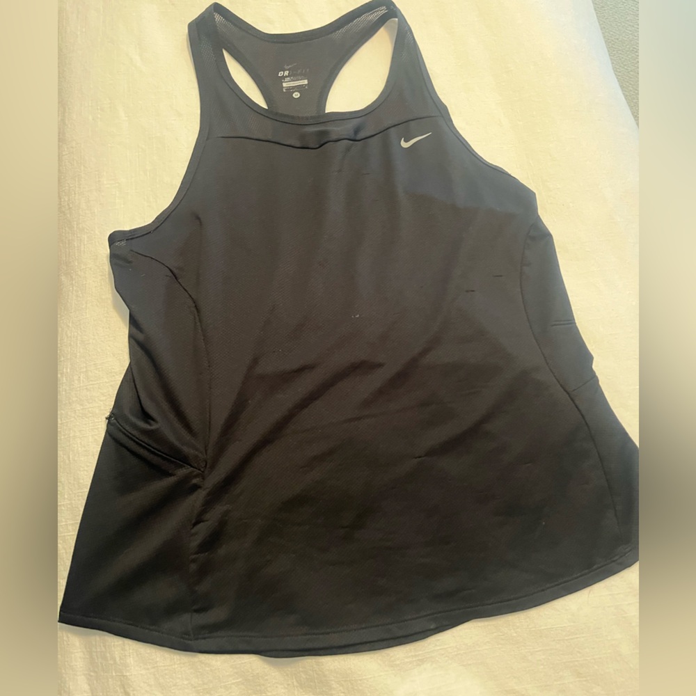 Nike Dri fit racer back running shirt 🏃🏼‍♀️ 
Size Medium  
Worn in